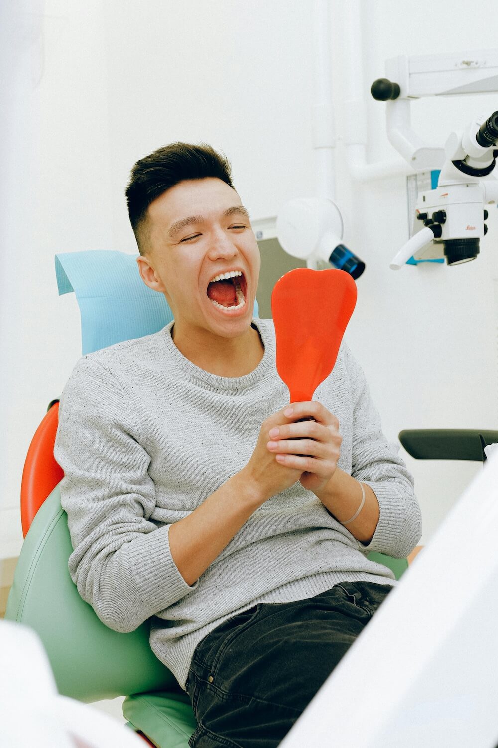 A patient smiling after receiving first class dental treatment at Ilkley Dental Care